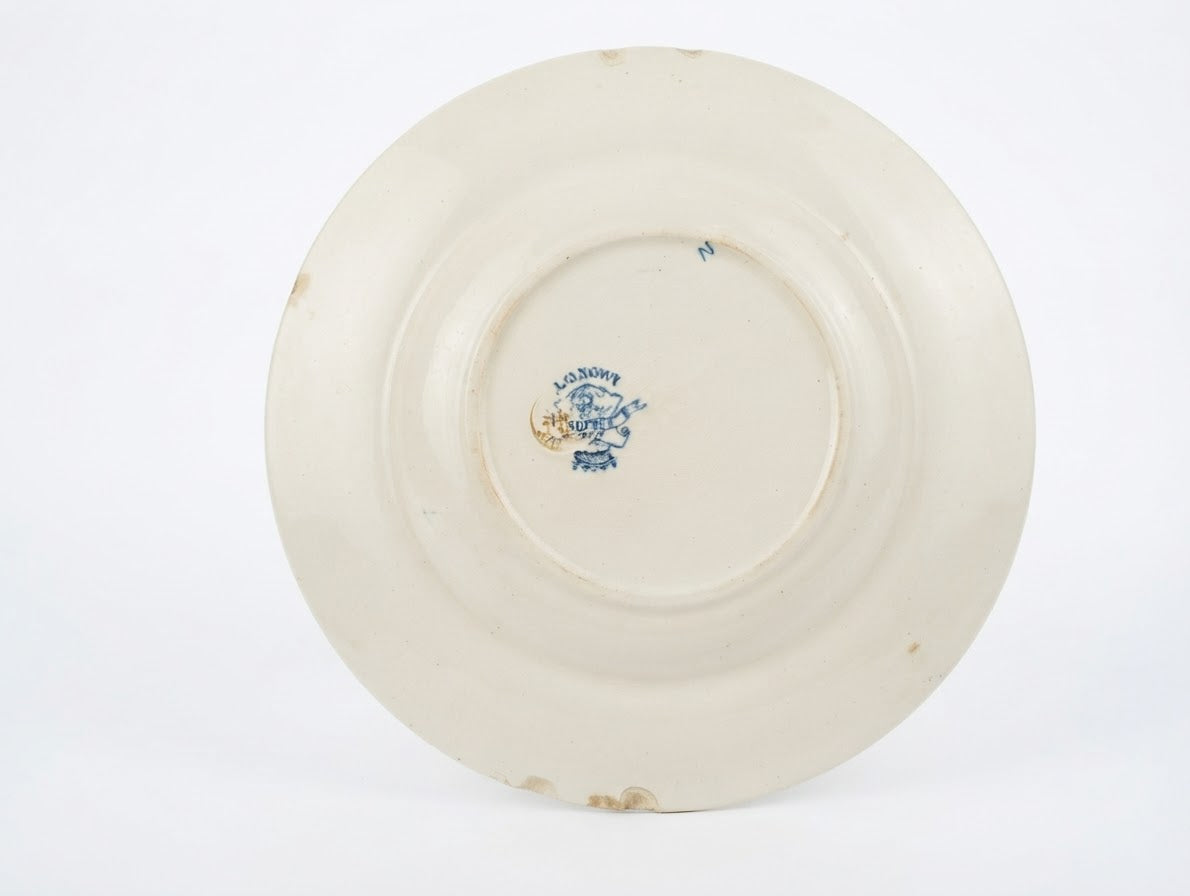 Assiette creuse ancienne terre de fer Longwy modèle Soleil marque Longwy modèle Soleil 