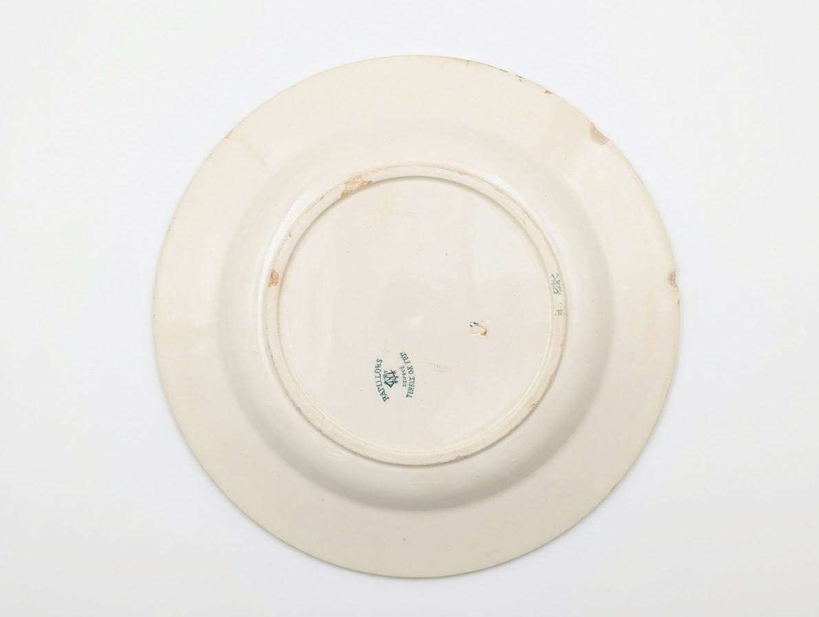 Dos assiette creuse ancienne en terre de fer modèle papillons Creil et Montereau avec marquage  CM Papillons 