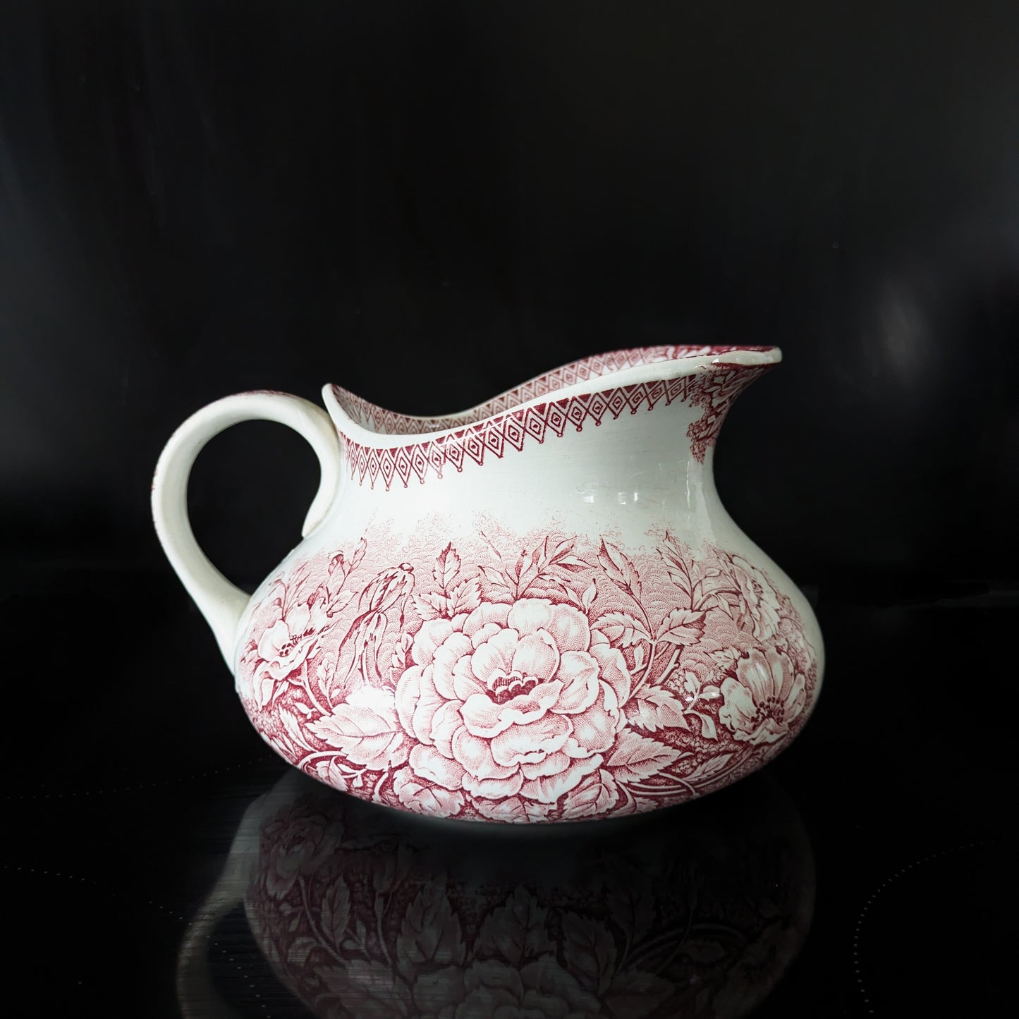 Old pitcher from the Castres earthenware factory with red floral decoration, Jardinière model