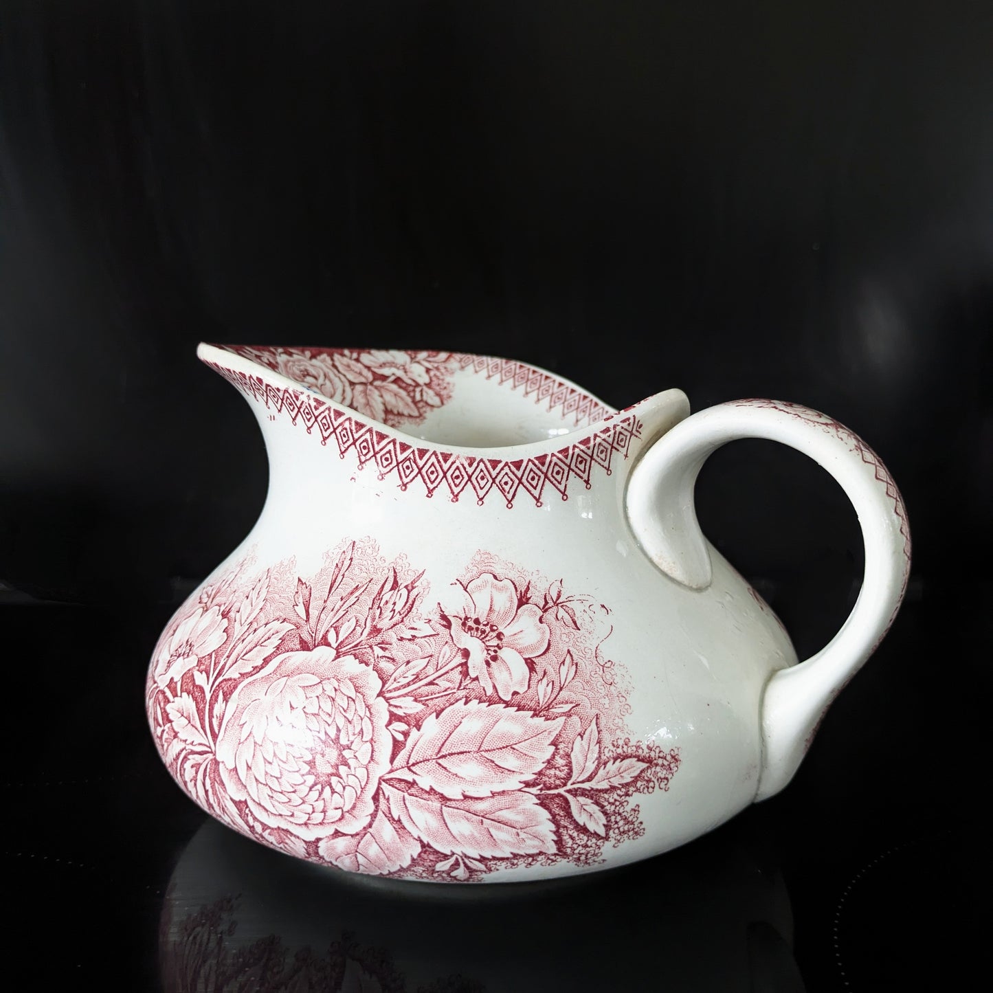 Old pitcher from the Castres earthenware factory with red floral decoration, Jardinière model