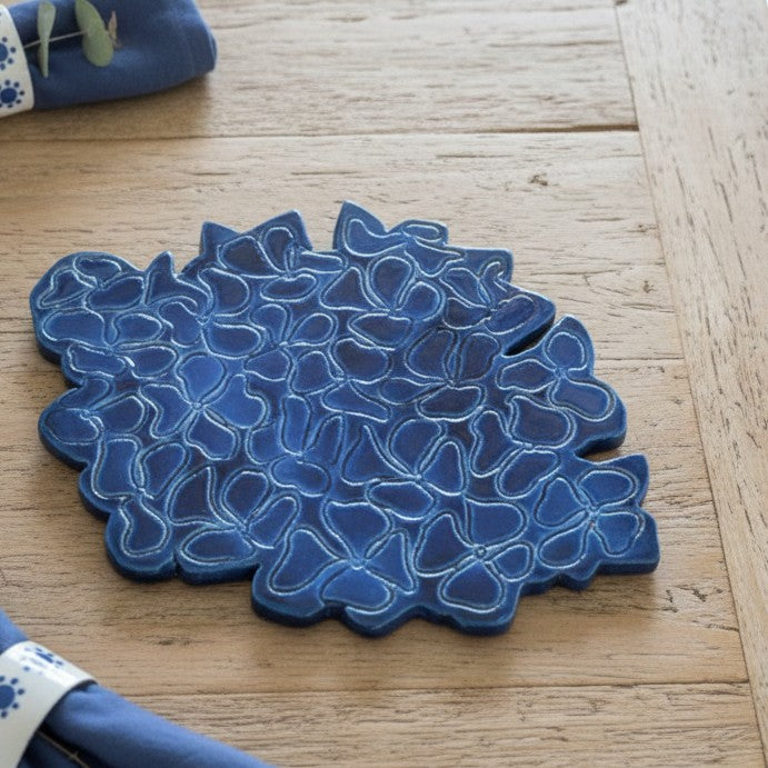 Dessous de plat en céramique émaillée signé